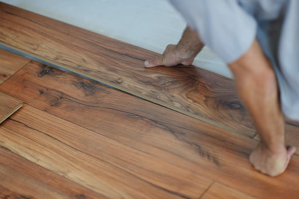 Installing laminate flooring in new home indoor