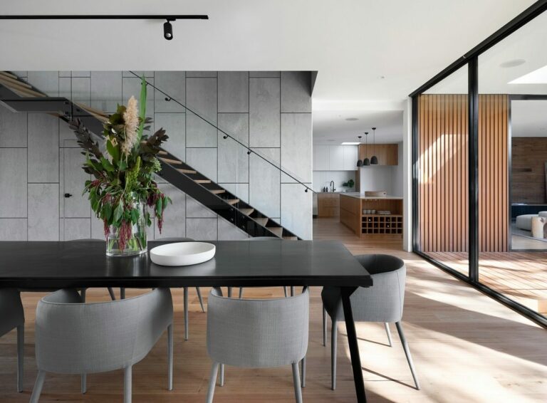 Modern kitchen with underfloor heating installed beneath wooden flooring