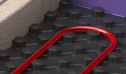 red hydronic water pipes on castellated panel system