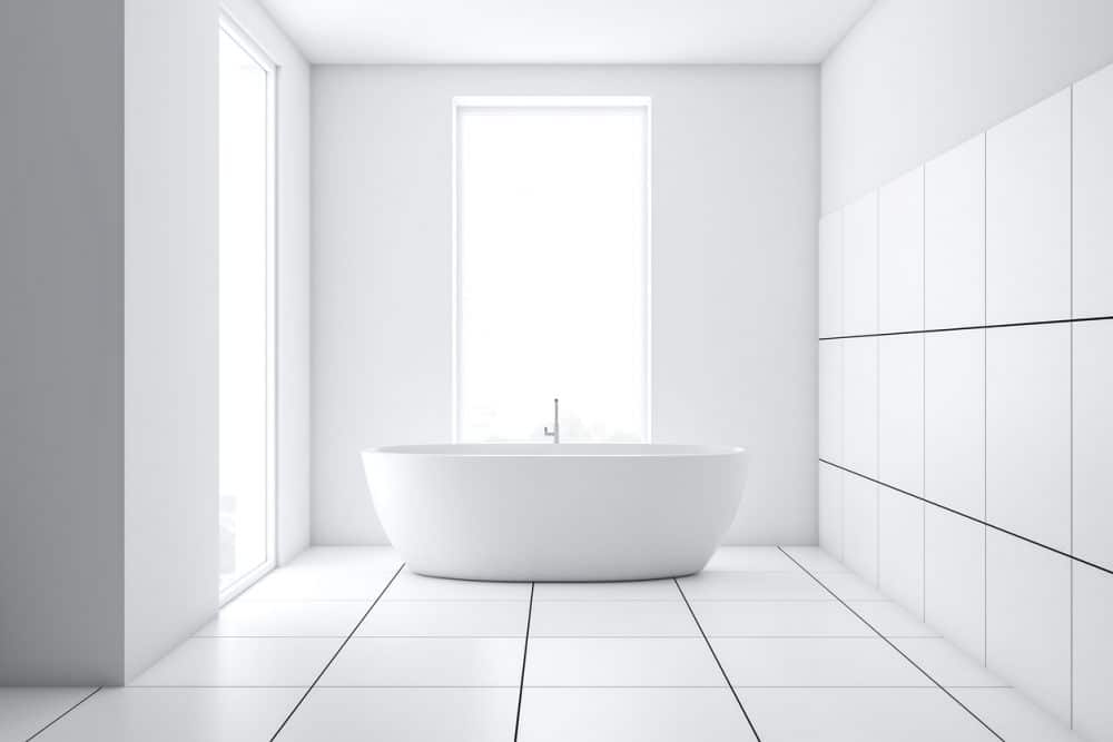 modern white tile bathroom interior with tub