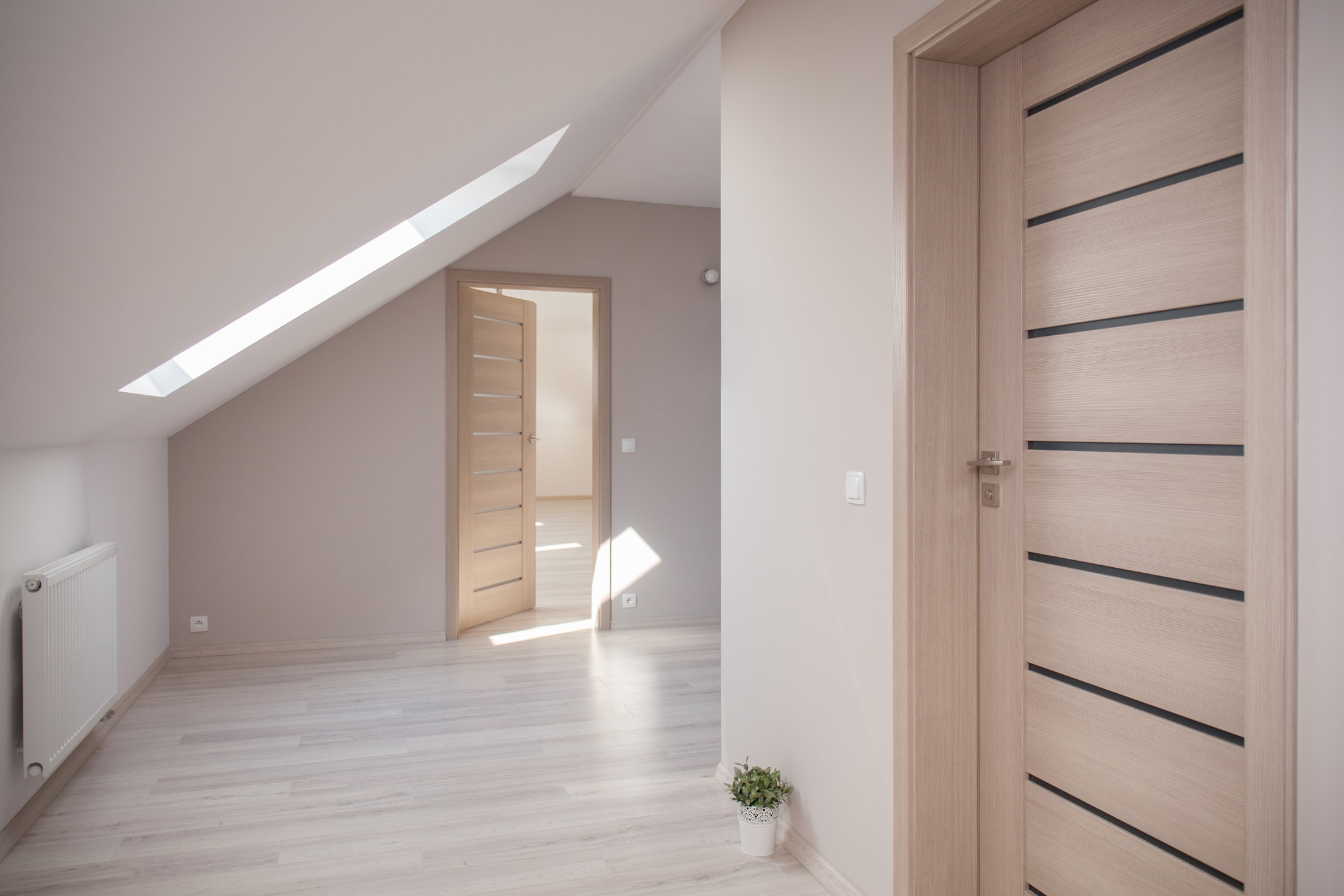 interior of beige room at the attic