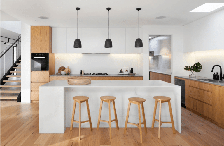 Underfloor heating installation process in a modern kitchen.