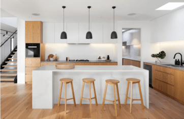 Underfloor heating installation process in a modern kitchen.