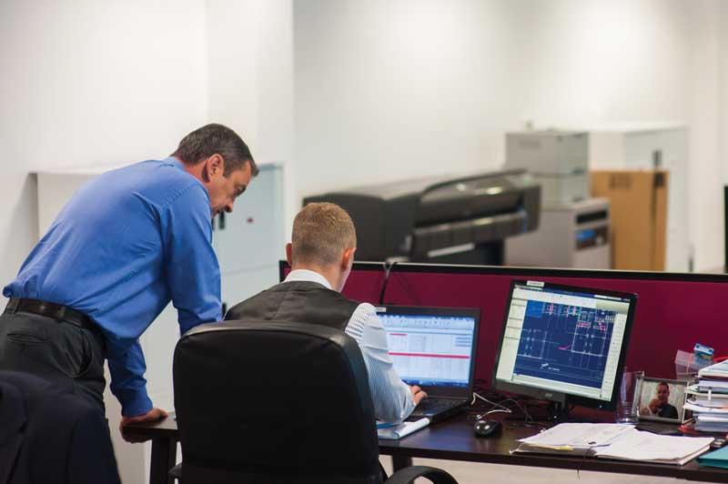 Team in discussion over a desk